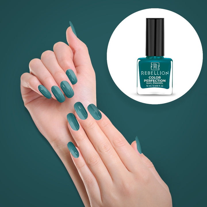 Rebellion teal green nail enamel application on nails