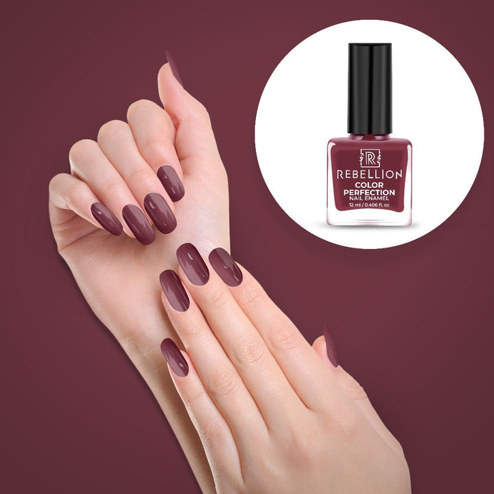 Rebellion reddish brown nail enamel application on nails