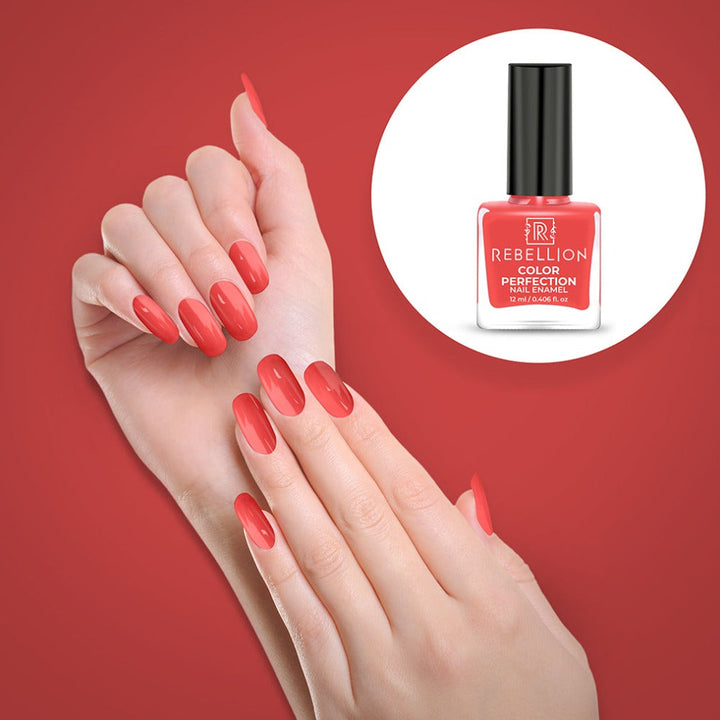 Rebellion coral peach nail enamel application on nails