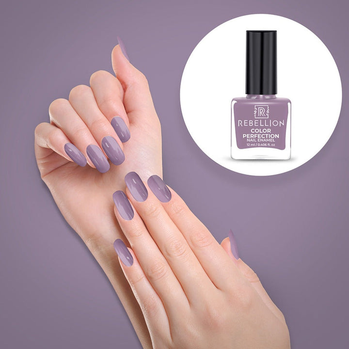 Rebellion dusky mauve nail enamel application on nails