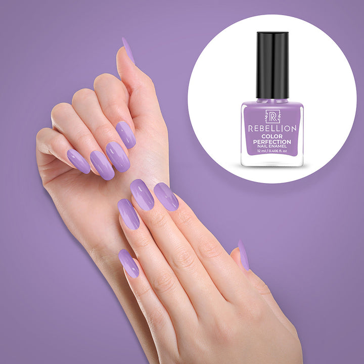Rebellion light violet nail enamel application on nails
