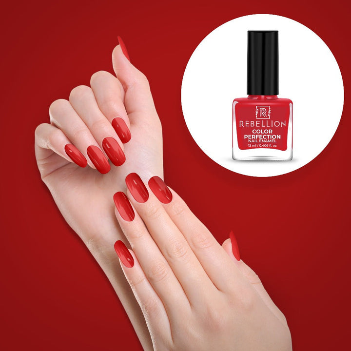 Rebellion hot red nail enamel application on nails