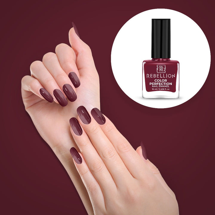 Rebellion red berry nail enamel application on nails