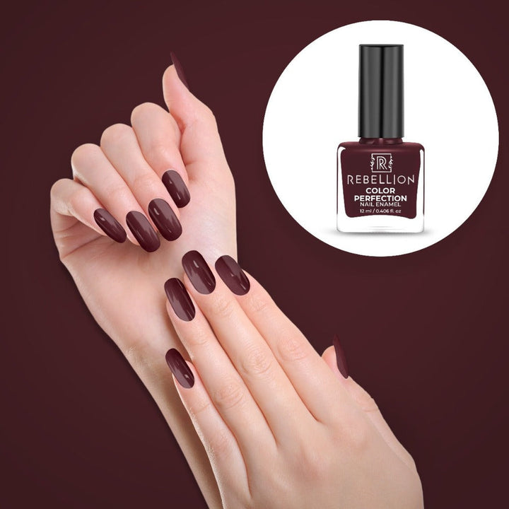 Rebellion wine nail enamel application on nails