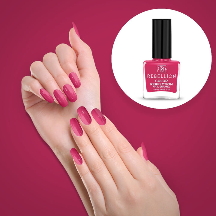 Rebellion fuchsia pink nail enamel application on nails