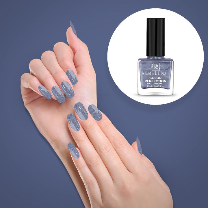 Rebellion metallic blue nail enamel application on nails