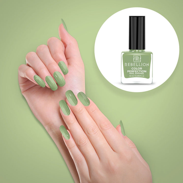 Rebellion mint green nail enamel application on nails
