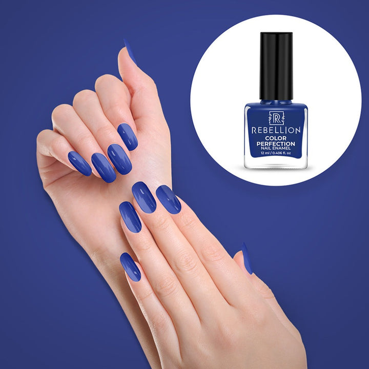 Rebellion blue nail enamel application on nails