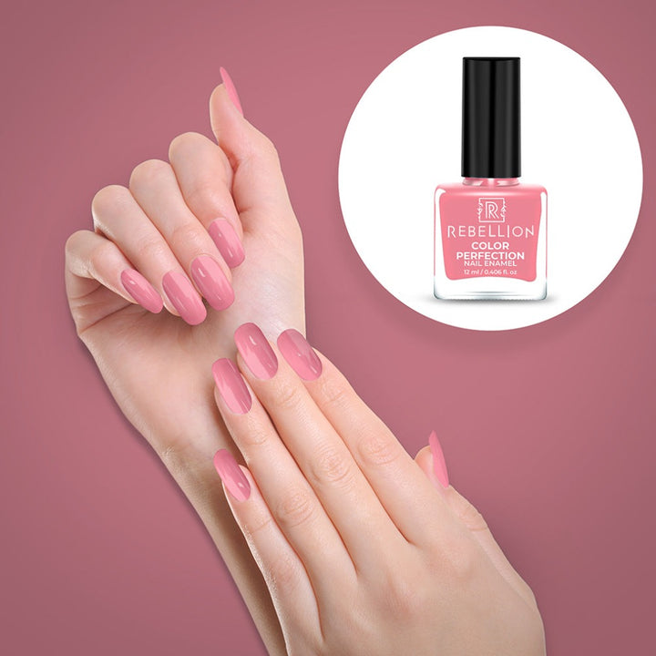 Rebellion soft pink nail enamel application on nails