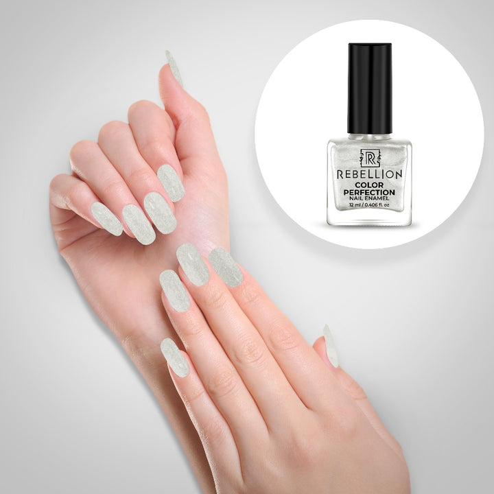 Rebellion pearl white nail enamel application on nails