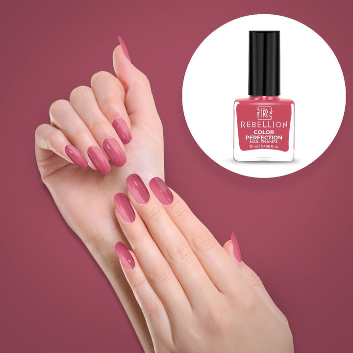 Rebellion pink blush nail enamel application on nails