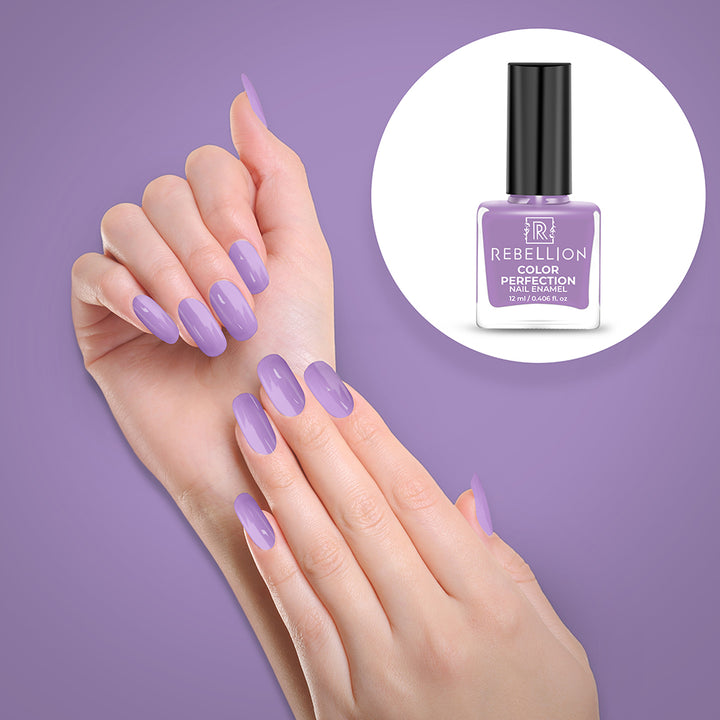 Rebellion light violet nail enamel application on nails