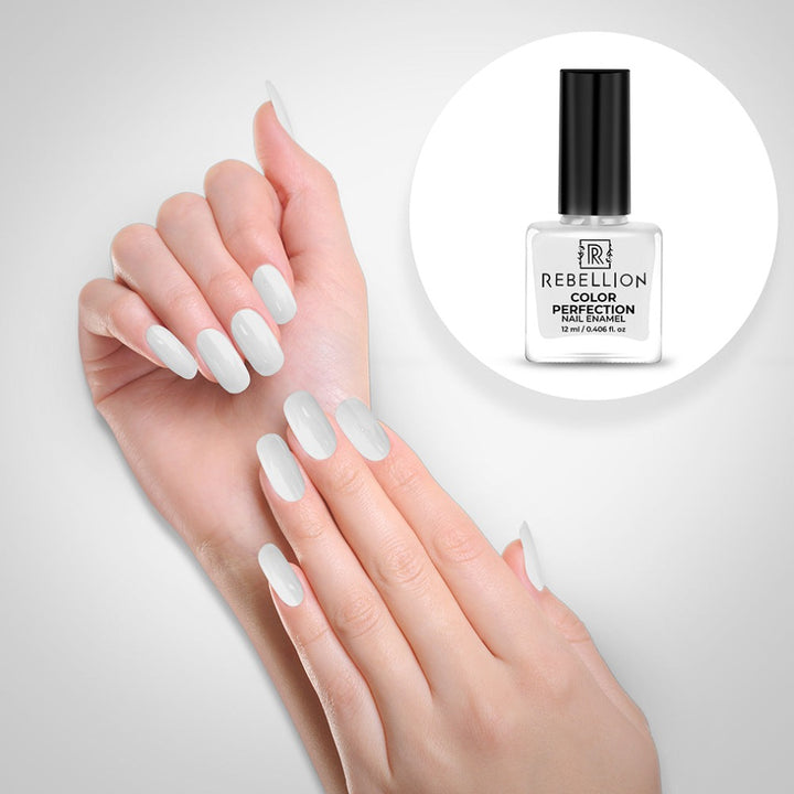 Rebellion white nail enamel application on nails
