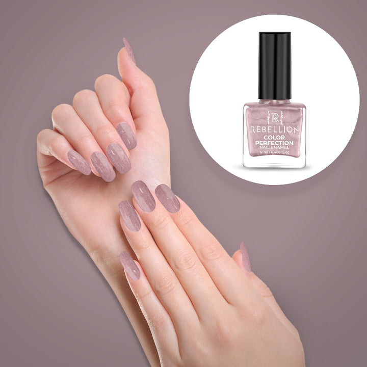 Rebellion pearl mauve nail enamel application on nails