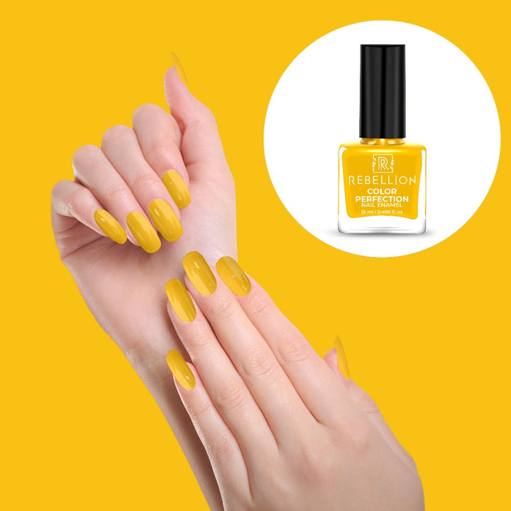 Rebellion yellow nail enamel application on nails