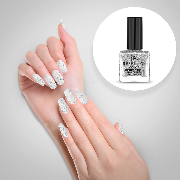 Rebellion silver glitter nail enamel application on nails