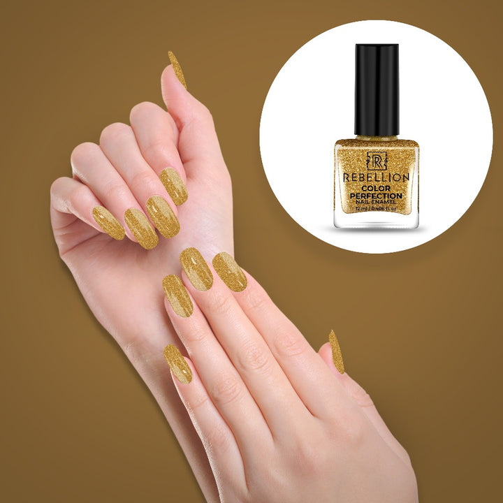 Rebellion gold glitter nail enamel application on nails